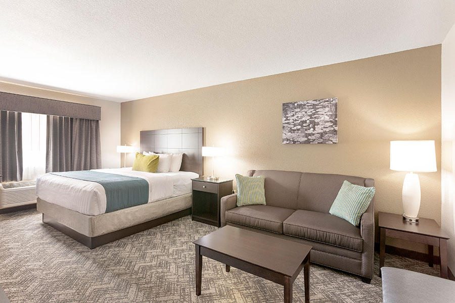 Comfort-Inn-Tualatin-Room-7 guest room with one king bed and sofa